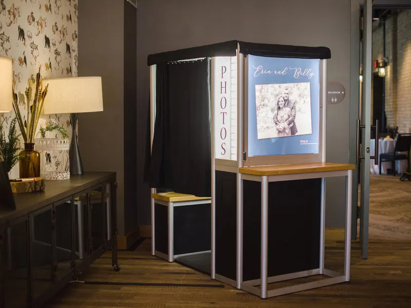 Enclosed photo booth at a wedding reception venue