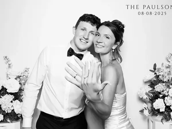 Glam photo booth portrait of a wedding couple
