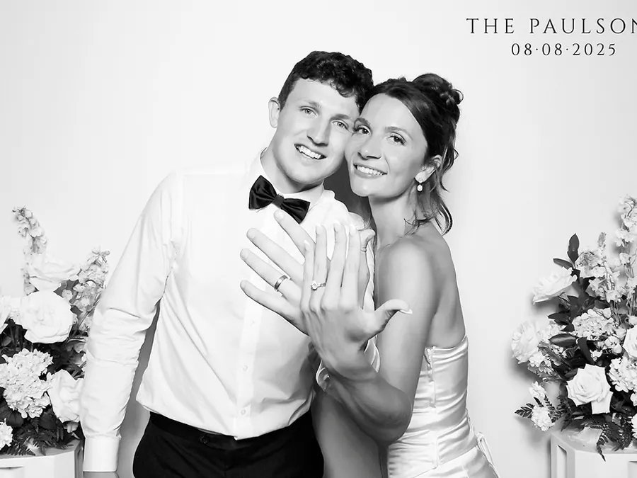 Black and white glam photo booth portrait of a wedding couple
