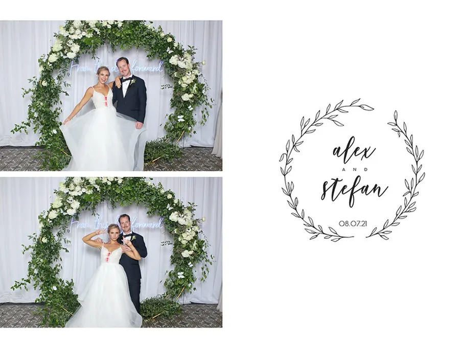 Wedding photo booth print under a greenery arch